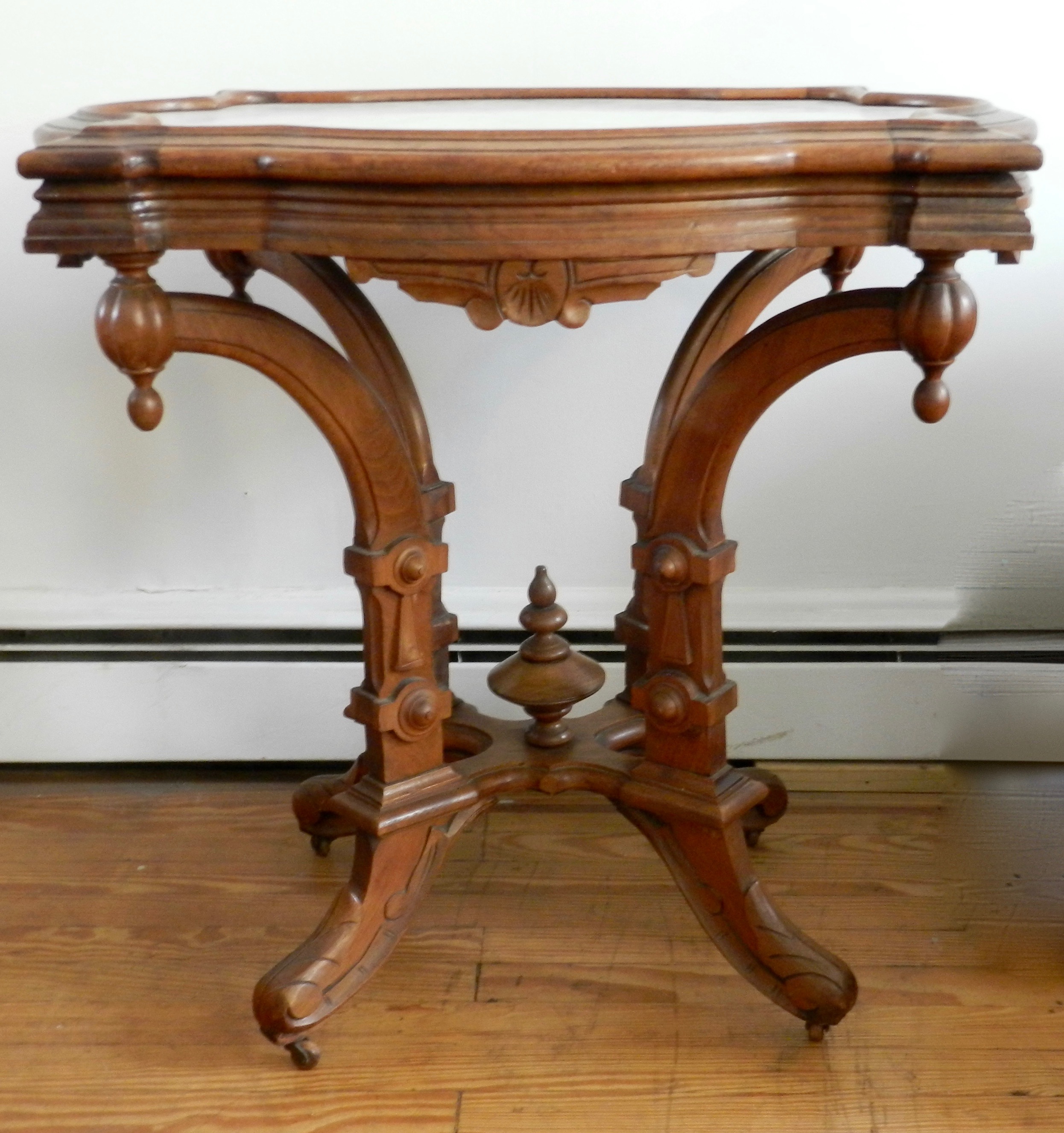 antique-eastlake-white-inset-marble-top-parlor-table-with-castors-for