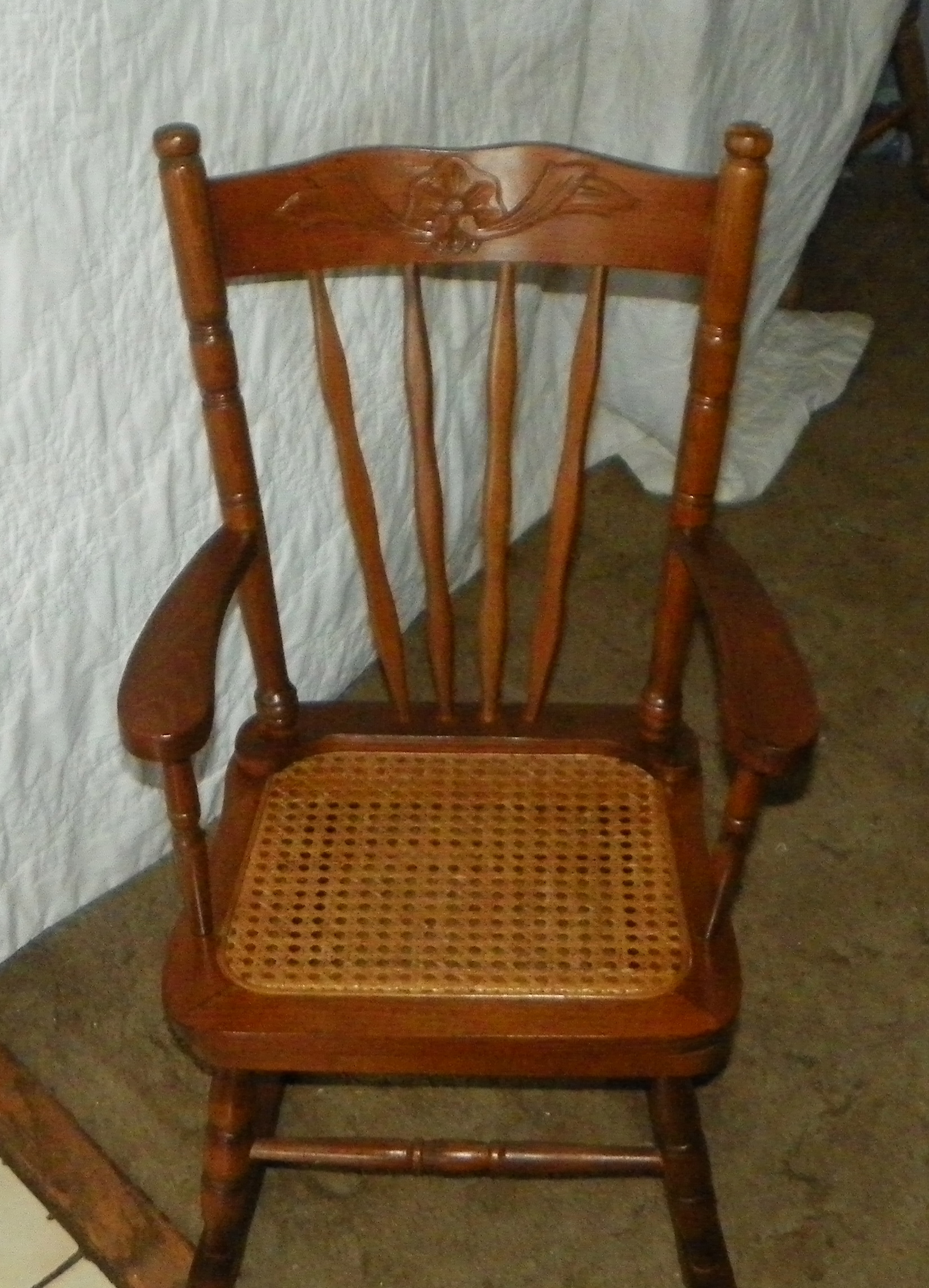 antique childs rocking chair with cane seat